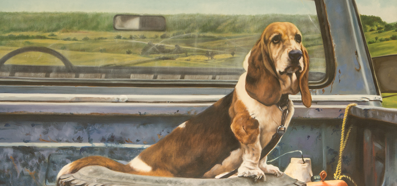 Longley Piece showing hound dog in bed of truck