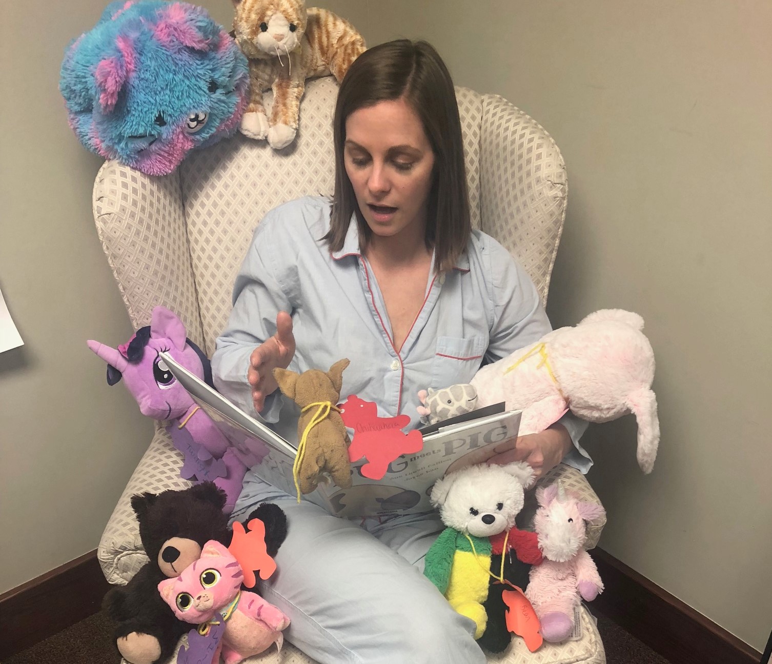 Stuffed animals listening to bedtime story