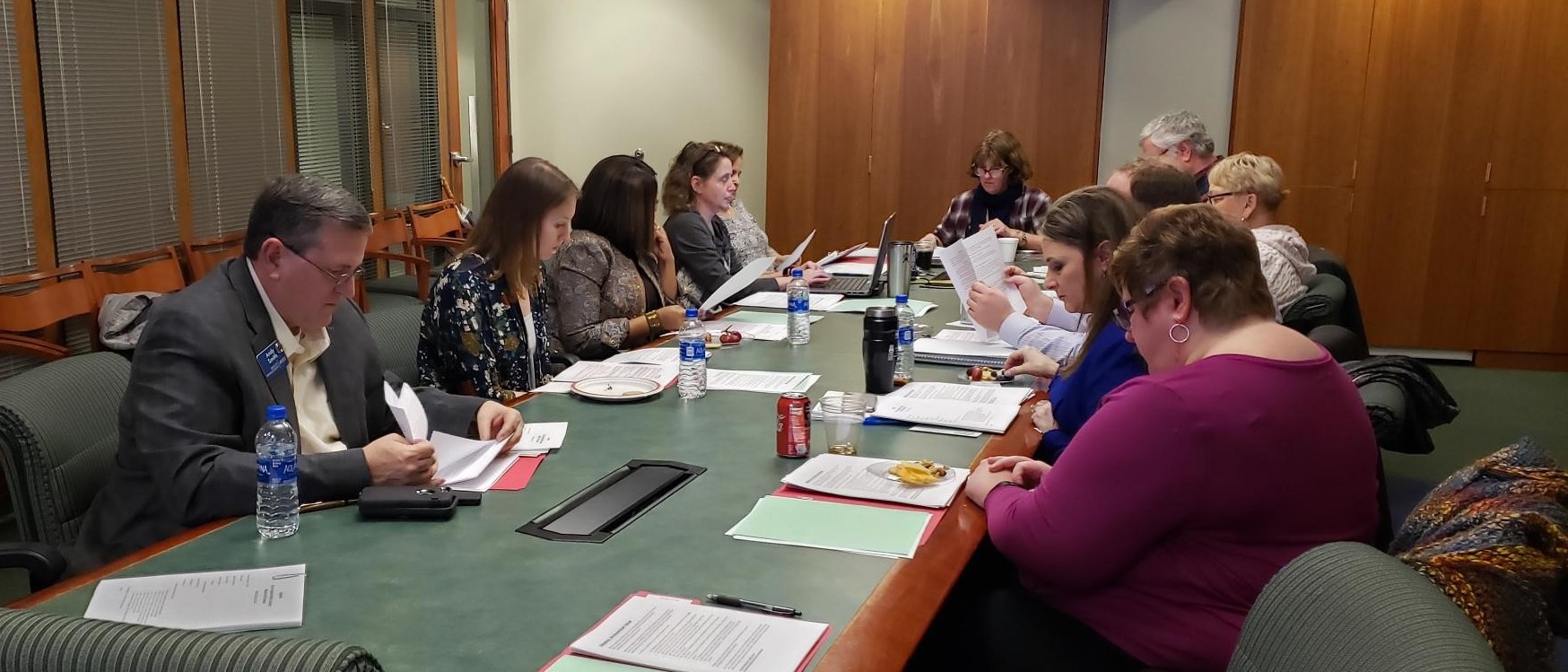 Board members sitting in conference room during a discussion