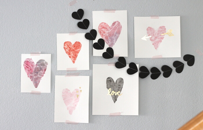 hearts on paper using watercolor paints