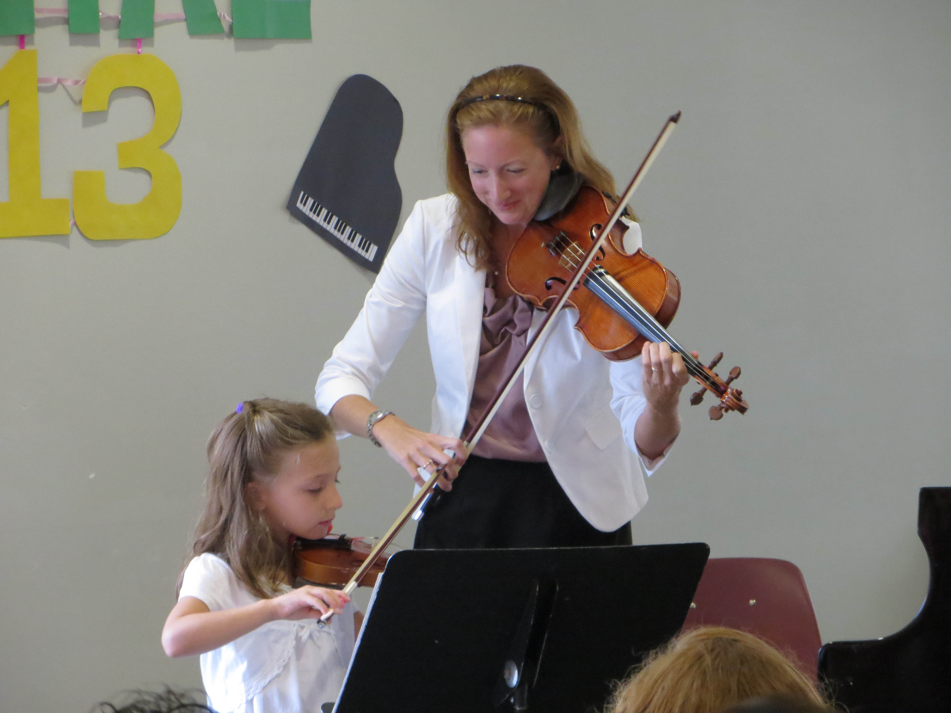 Violin teacher and student