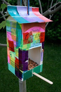 bird feeder made out a milk carton