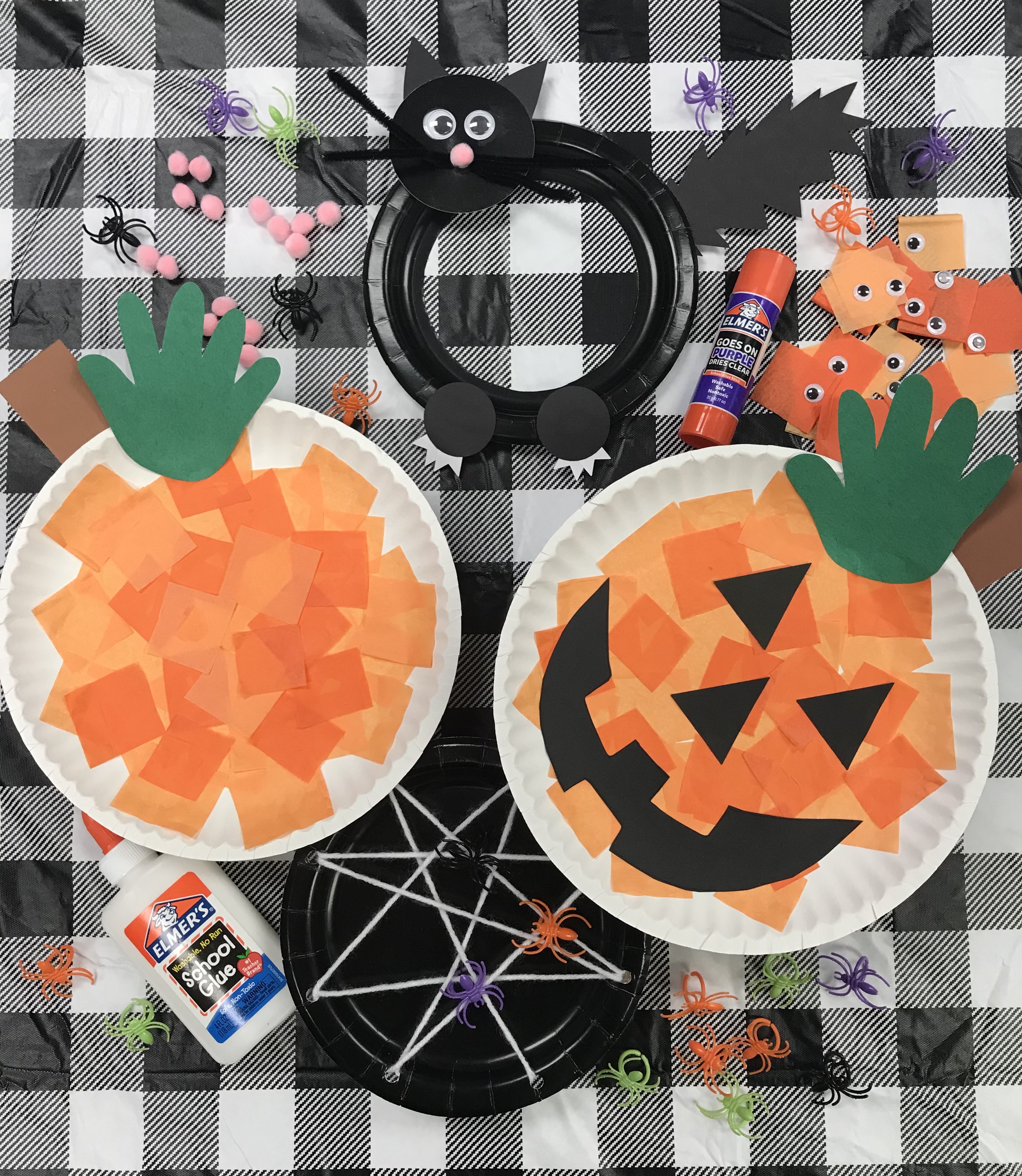 Paper plate spider web, black cat, pumpkin, and jack-o-lantern