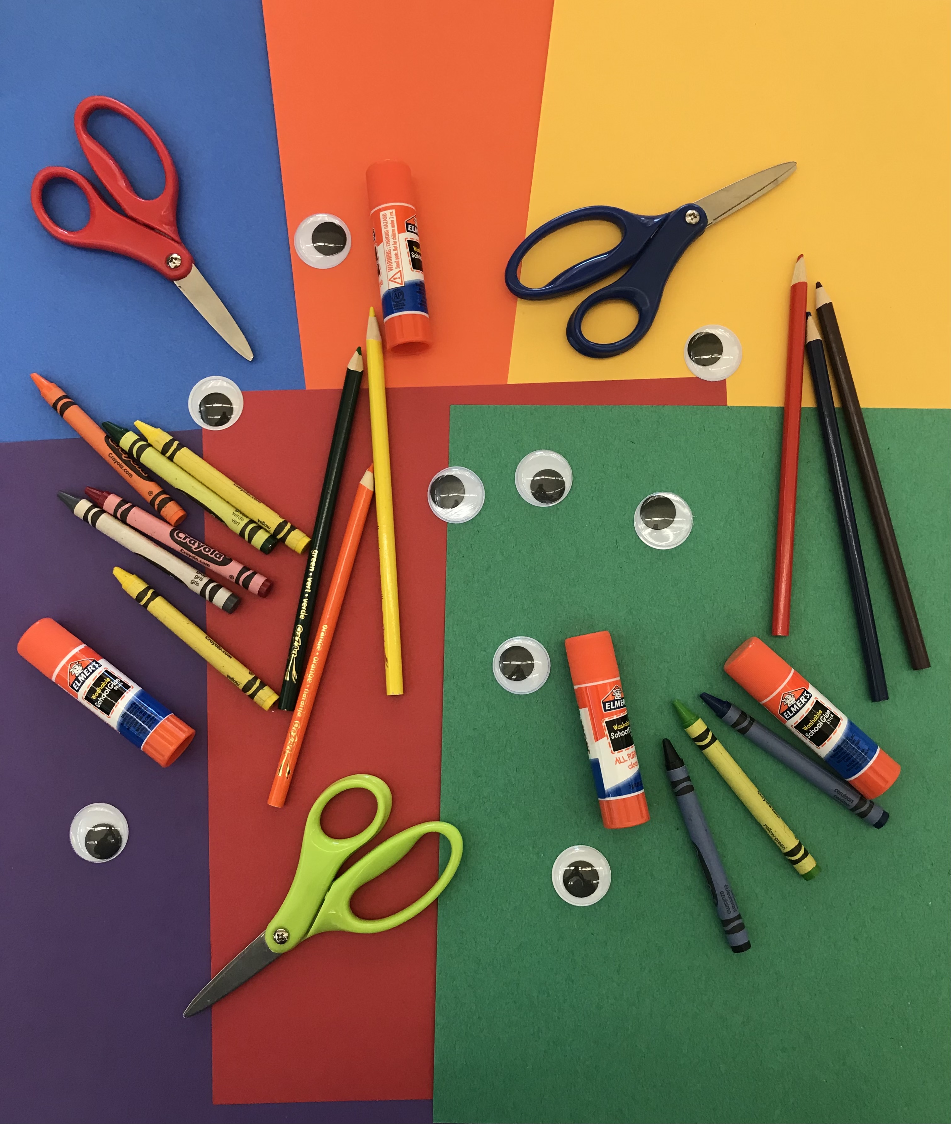 Craft supplies - glue, scissors, crayons, construction paper, wiggle eyes