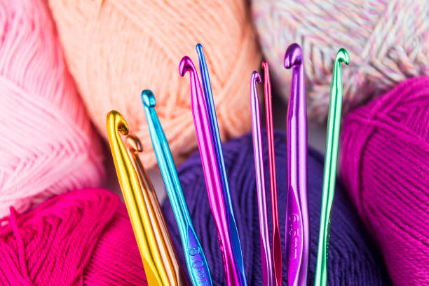 colorful crochet hooks with yarn