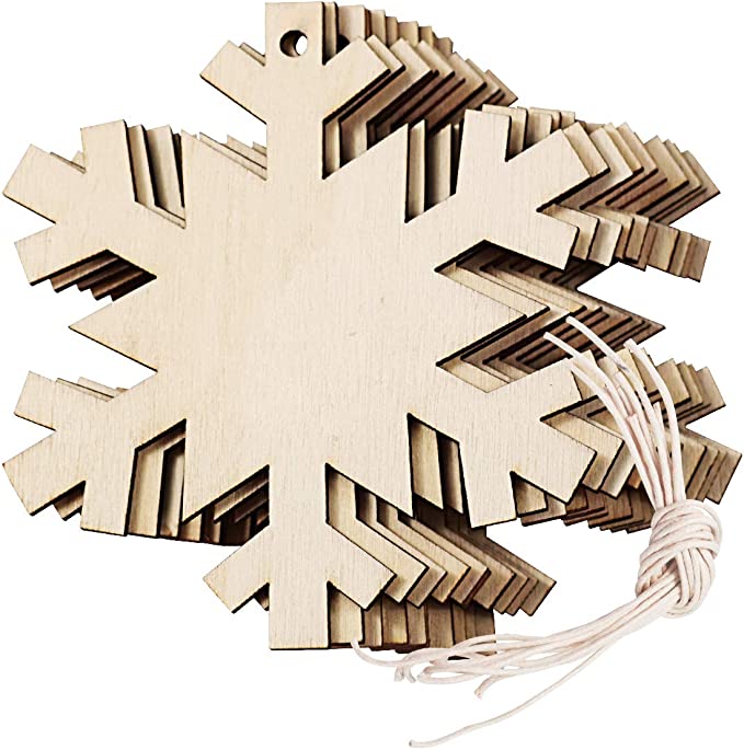 Wooden Snowflake with a string hanging from it. 