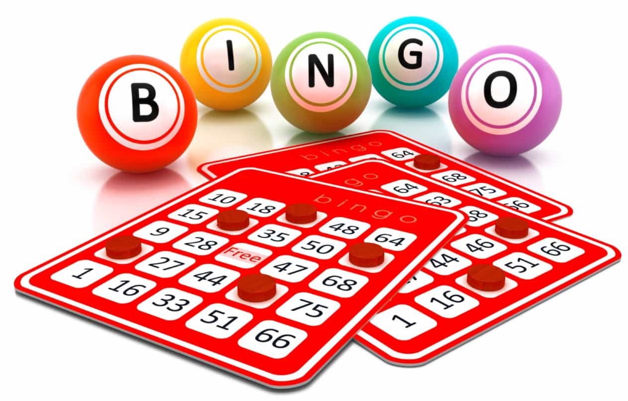 Bingo spelled out in multicolored balls with three or four bingo cards with random spot marked in red on them. 