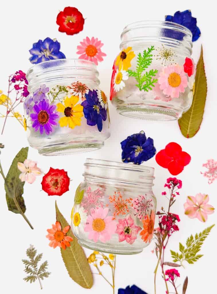 glass jars with pressed flowers