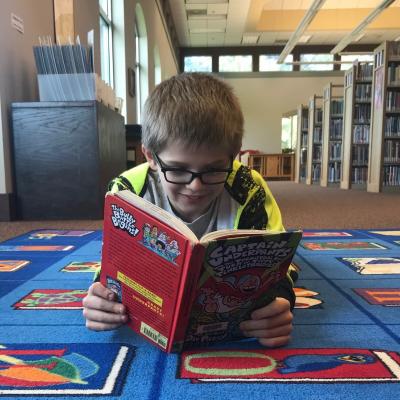 Boy who got caught reading Captain Underpants in library