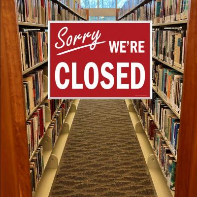 library book shelves with closed sign
