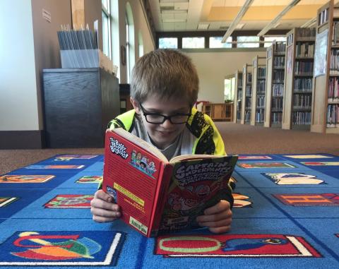 Boy who got caught reading Captain Underpants in library