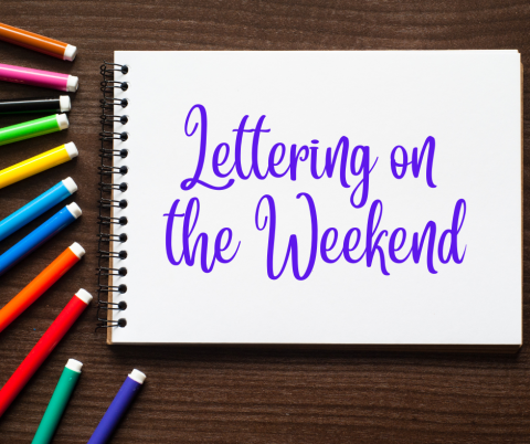 markers and notebook with Lettering on the Weekend
