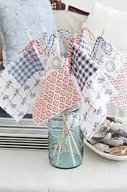 scrap fabric flags in a blue jar
