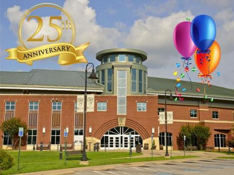 Photo of the Main Library with "25th Anniversary" in gold and three colorful balloons