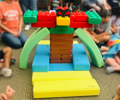 what looks like a robot build out of large foam blocks