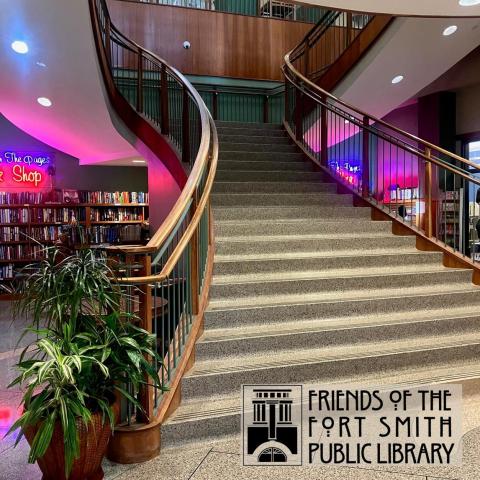 photo of the stairway at the main library with the Friends of the Library Logo at the bottom