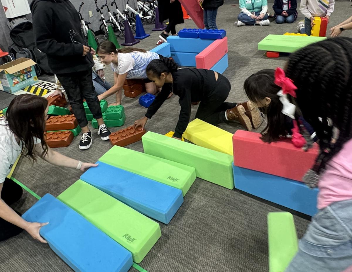girls building with large blocks