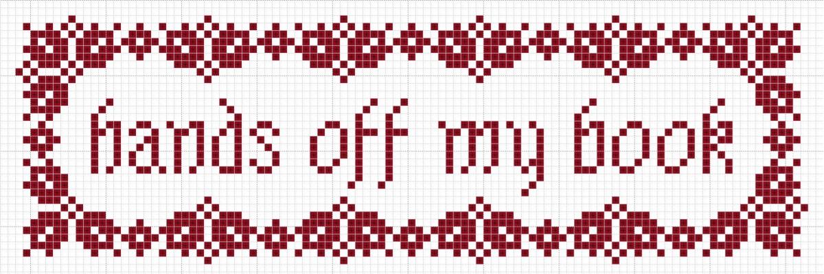 Cross stitched book mark that says "hands off my book"